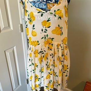 Kate Spade romper lemon and white size large pockets!